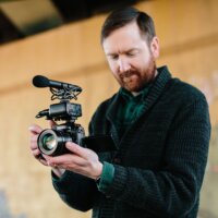 Panasonic Lumix GH5M2 Digitális fényképezőgép + LEICA DG Vario-Elmarit 12-60 KIT - Fekete