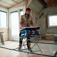 Bosch GTS 18V-216 Professional Akkumulátoros asztali körfűrész + GTA 560 Professional Munkaasztal (Akku és töltő nélkül)